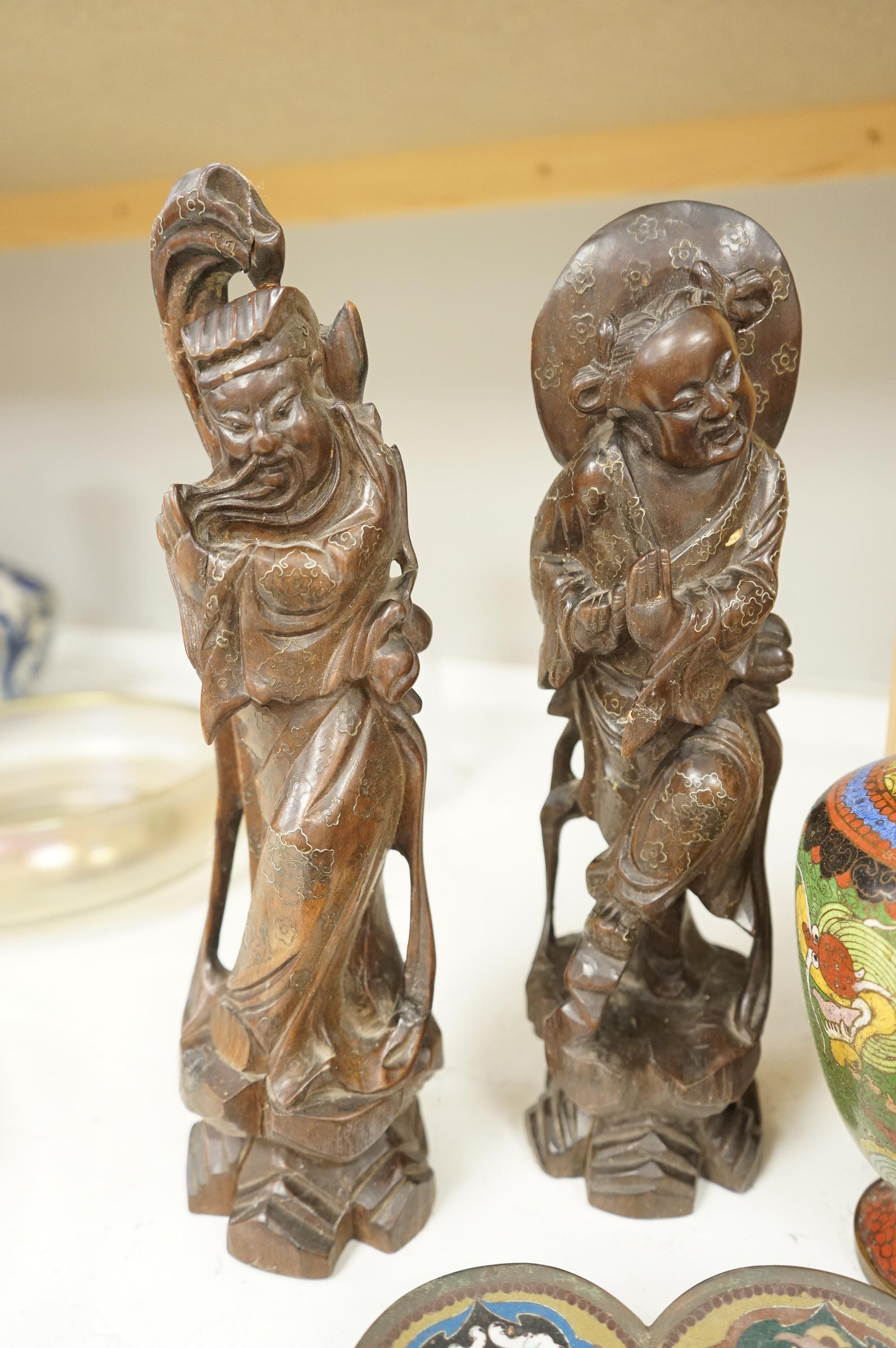 A Japanese cloisonné enamel dish, a Chinese cloisonné enamel vase and three Chinese carved wood figures, largest 39cm high